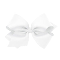 Wee Ones King White bow on a WeeStay clip for secure everyday wear