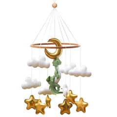 Wenqik crib mobile over crib offers calming forest vibes.