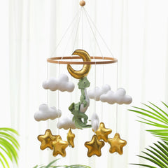 Wenqik woodland mobile easily hangs from the crib bracket.