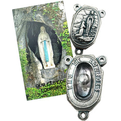 Westmon Works Lourdes Water Centerpiece capsule close-up, authentic Lourdes water for meaningful rosary devotion.