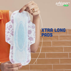 Whisper Ultra Choice Wings absorbent core close-up signaling quick absorption