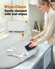 Widitn changing pad strap keeps baby secure during changes