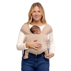 WildBird Aerial Buckle Wrap on newborn shows wrap-like coziness.