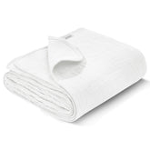 Wimist muslin swaddle blanket flat lay in white, showing versatile newborn care use