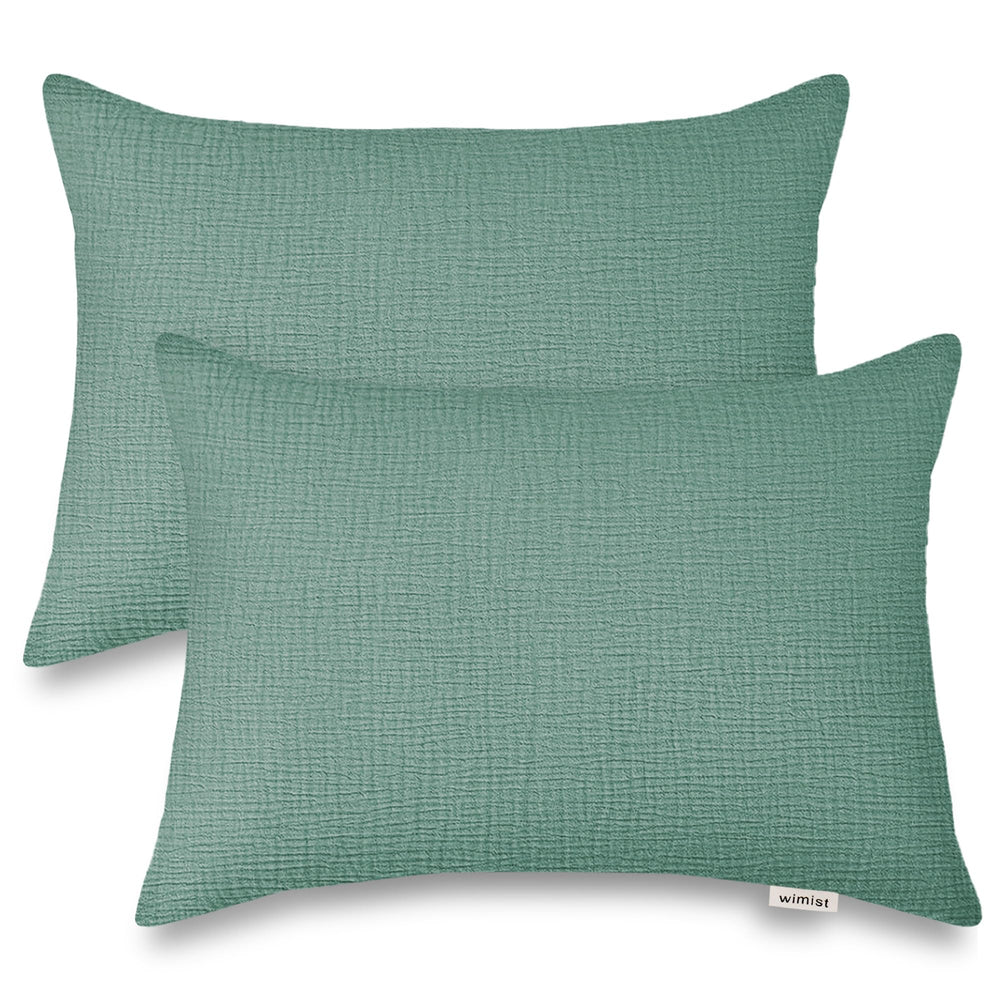 Wimist toddler pillowcase in Roman Green, 13x18 closeup, breathable muslin for soothing sleep.
