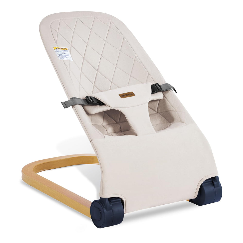 Winchild baby bouncer in wood grain style provides soothing motion for newborns.