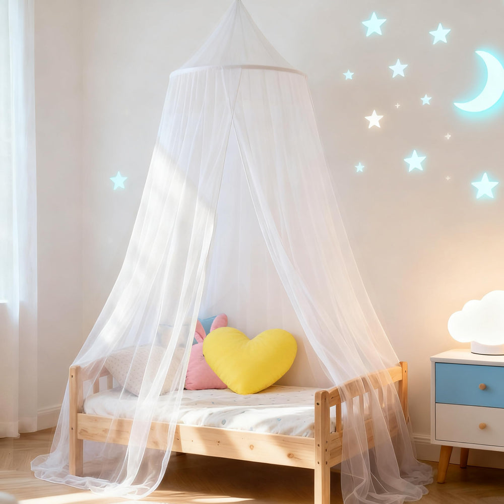 Wnqou white bed canopy draped over a bed to create a cozy sleep nook.