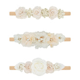 WNYUJOY flower headbands set in pink, peach, and lavender for stylish baby looks.