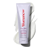 Womaness Coco Bliss bottle closeup highlighting creamy hydration for daily comfort