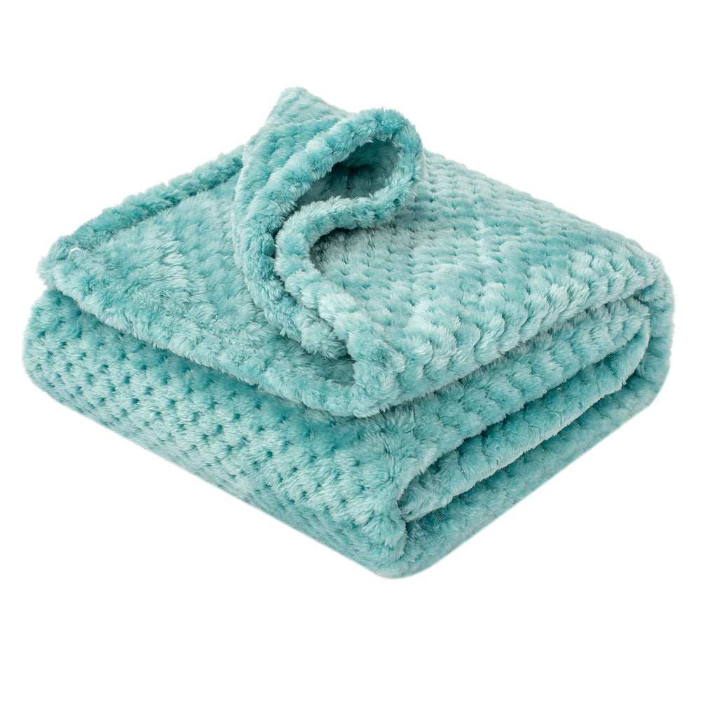 Wonder Miracle fuzzy blanket blue bell spread offers soft warmth for baby's cozy naps.