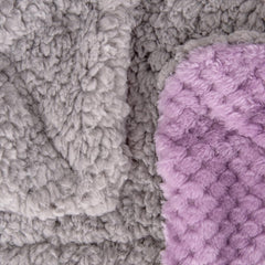Wonder Miracle fuzzy sherpa blanket as a crib blanket for added nap-time warmth.