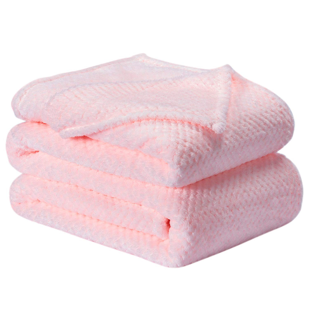 Wonder Miracle fuzzy throw blanket on bed for cozy warmth