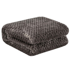 Wonder Miracle fuzzy throw blanket in Eagle Grey folded for easy travel