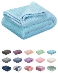 Wonder Miracle fuzzy throw blanket in ice blue folded for travel warmth