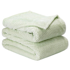 Wonder Miracle fuzzy throw blanket on bed, queen size for cozy warmth