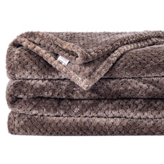 Wonder Miracle plush fleece-knit blanket delivering soft warmth