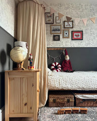 Wonder Space frilled cotton tent over crib adds charm and privacy for naps.