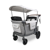 WonderFold Outdoor L4 quad wagon in gray collapsed for compact storage after a family stroll.