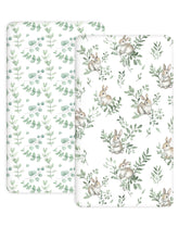 Woodiville crib sheets with Bunny Meadow pattern closeup for a cozy nursery ambiance