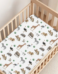 Woodiville mini crib sheets feature stain-concealing design for easy maintenance.