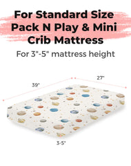 Woodiville Stellar Adventure sheet on a mini crib mattress demonstrating snug fit.