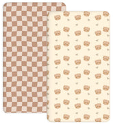 Woodiville Teddy Bow crib sheet close-up showing secure elastic edge for a snug fit.