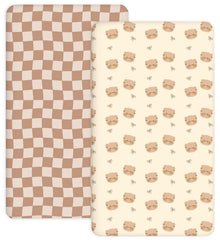 Woodiville Teddy Bow crib sheet close-up showing secure elastic edge for a snug fit.