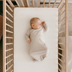 Woolino infant nightgown fold-over cuffs prevent scratching while soothing sleep.