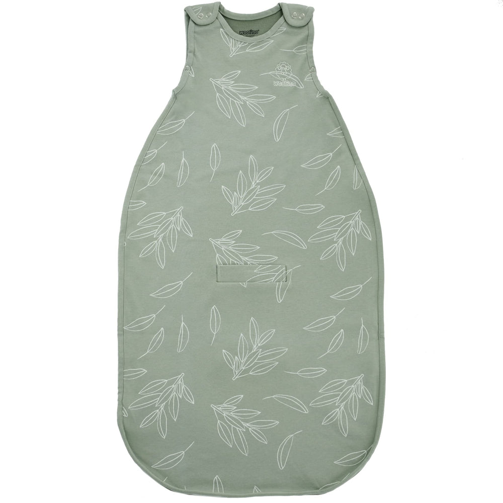 Woolino Merino Ultimate Sleep Sack in Sage shown on crib for year round comfort.