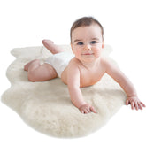 Woolino Sheepskin Rug Ivory—cozy bedroom decor with plush warmth.