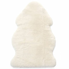 Woolino Sheepskin Rug Ivory used as crib liner for baby comfort.