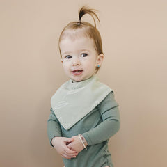 Woolino striped bib image emphasizes style and moisture absorption.