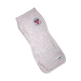 Woombie Cotton Swaddle Sock worn as a wearable blanket for calm newborns.