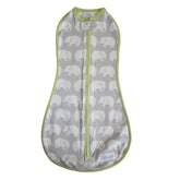 Woombie Stardust Elephant swaddle setup provides snug comfort for peaceful sleep.