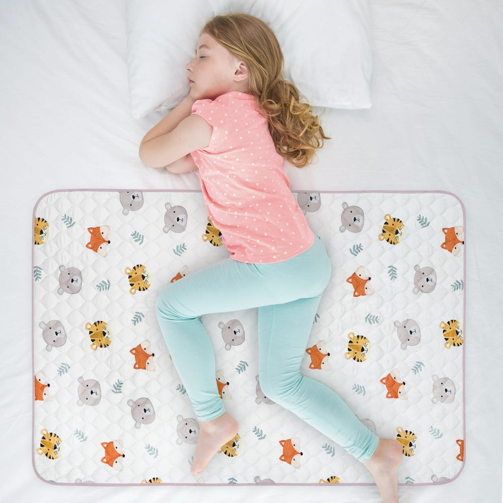 WOVENX kid bed pad with bamboo-soft layer for gentle overnight protection
