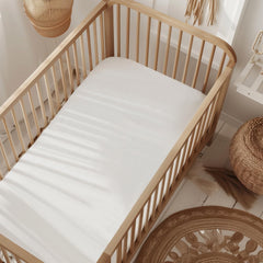 Wovenx organic crib sheet and protector front view with soft breathable bamboo surface