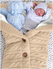 XMWEALTHY swaddle with wooden button closure detail for snug changes.