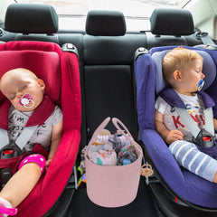 Xuanguo diaper caddy pink with sturdy handles for easy transport between rooms.