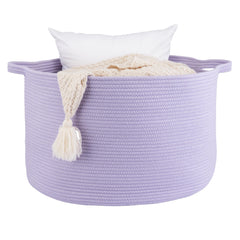 XUANGUO round cotton rope basket for blankets keeps living room organized and accessible.