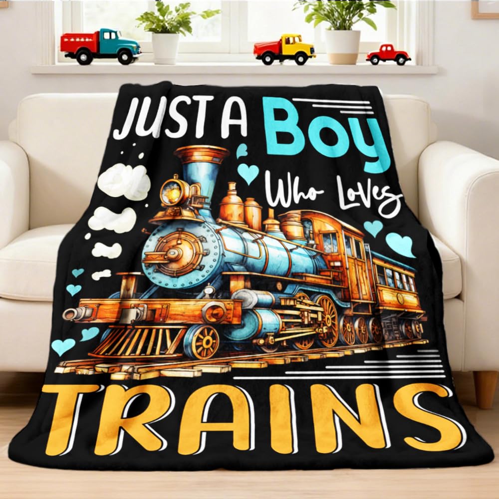 Xvx-Boom train set blanket with kids design provides cozy warmth for playtime.