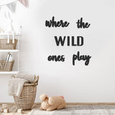 Xylolfsty Where the Wild Ones Play wall sign enhances a playful kids' room decor.