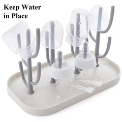 XYW rack hangs various bottles, nipples, and pacifiers to air dry.