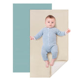 YACODAVO leather changing mat folded to palm size for on-the-go diaper changes.