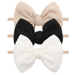 YanJie 3pc soft headbands in black, white, beige with bows for versatile baby outfits.