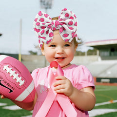 YanJie pink football bows on headband, breathable waffle fabric supports gentle skin during play
