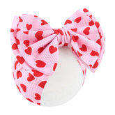 YanJie baby headband bow with large red heart for adorable newborn styling.