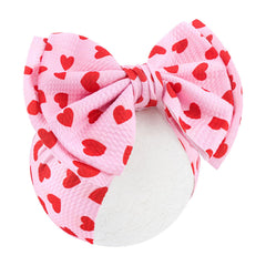YanJie baby headband bow with large red heart for adorable newborn styling.