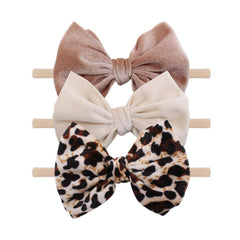 YanJie four-piece Halloween headbands set for newborns and toddlers—soft nylon, comfortable stretch.