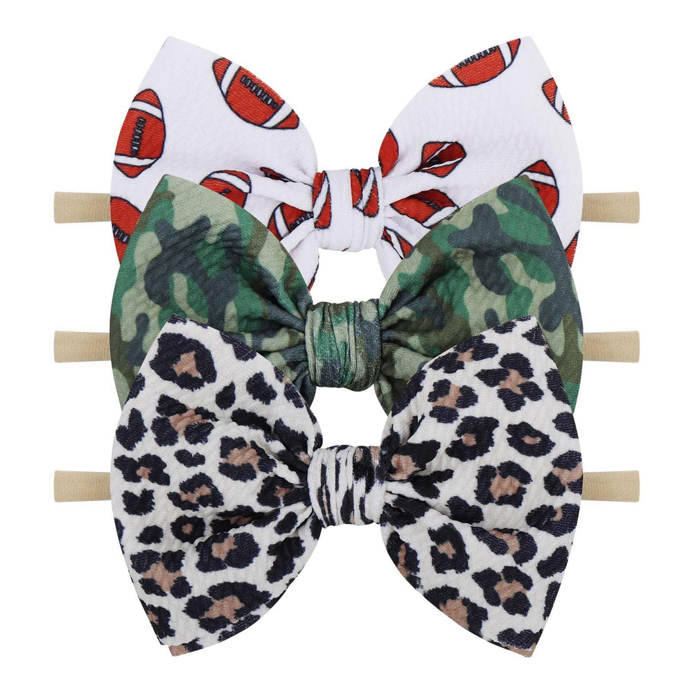 YanJie leopard camo headband for newborns with soft nylon band and gentle fit.