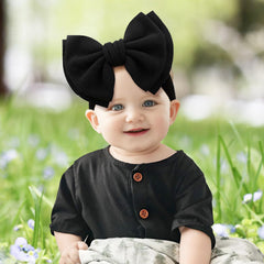 YanJie headband on a baby wearing red bow, ideal for photoshoots